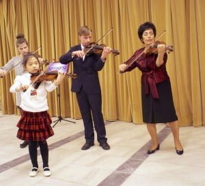 Music school Warsaw: violin lessons our mission, music school in warsaw - teacher and students