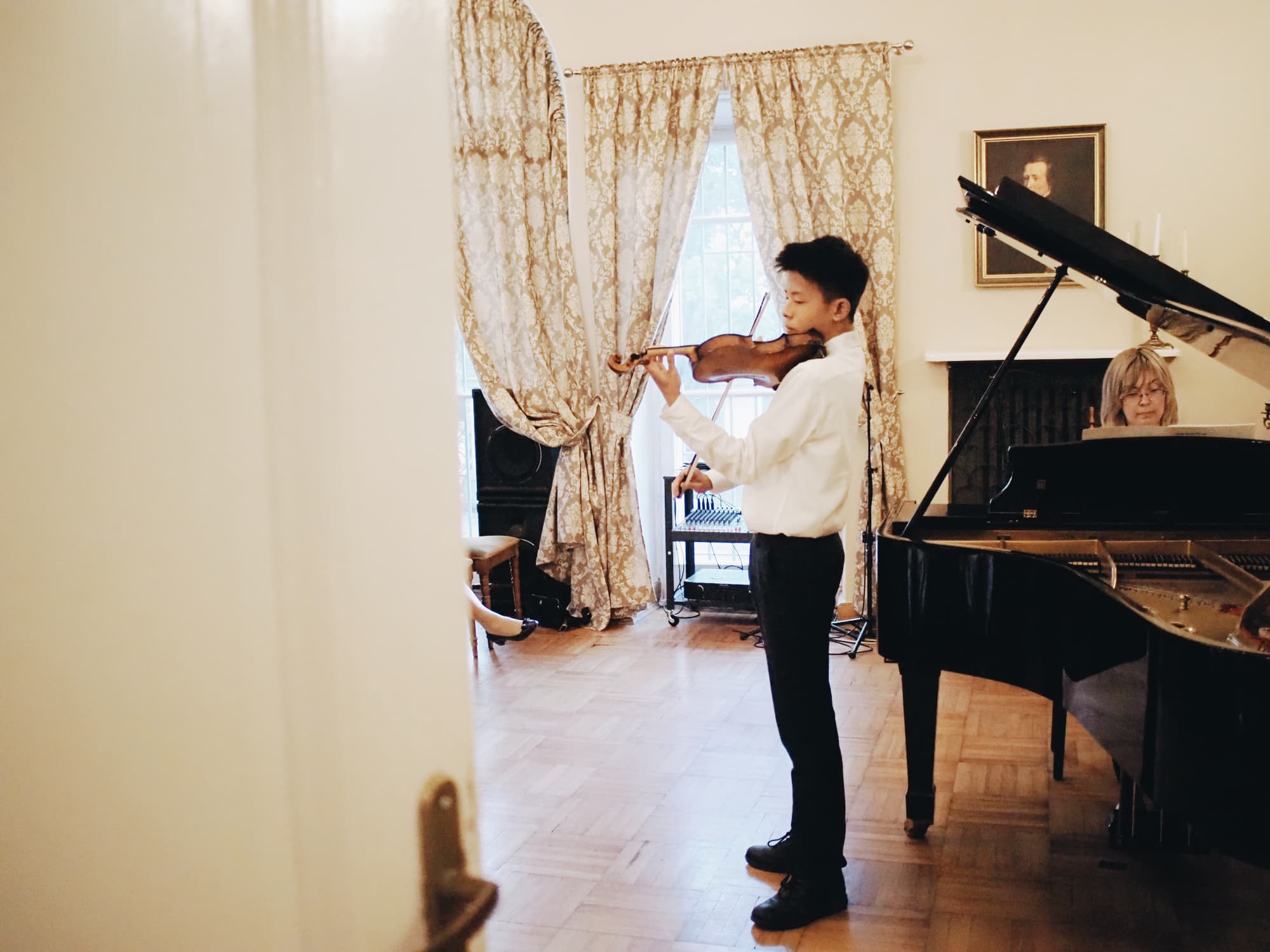 Violin solo at the Annual Concert 2026 A young violinist performing a solo at the Annual Concert of 2026