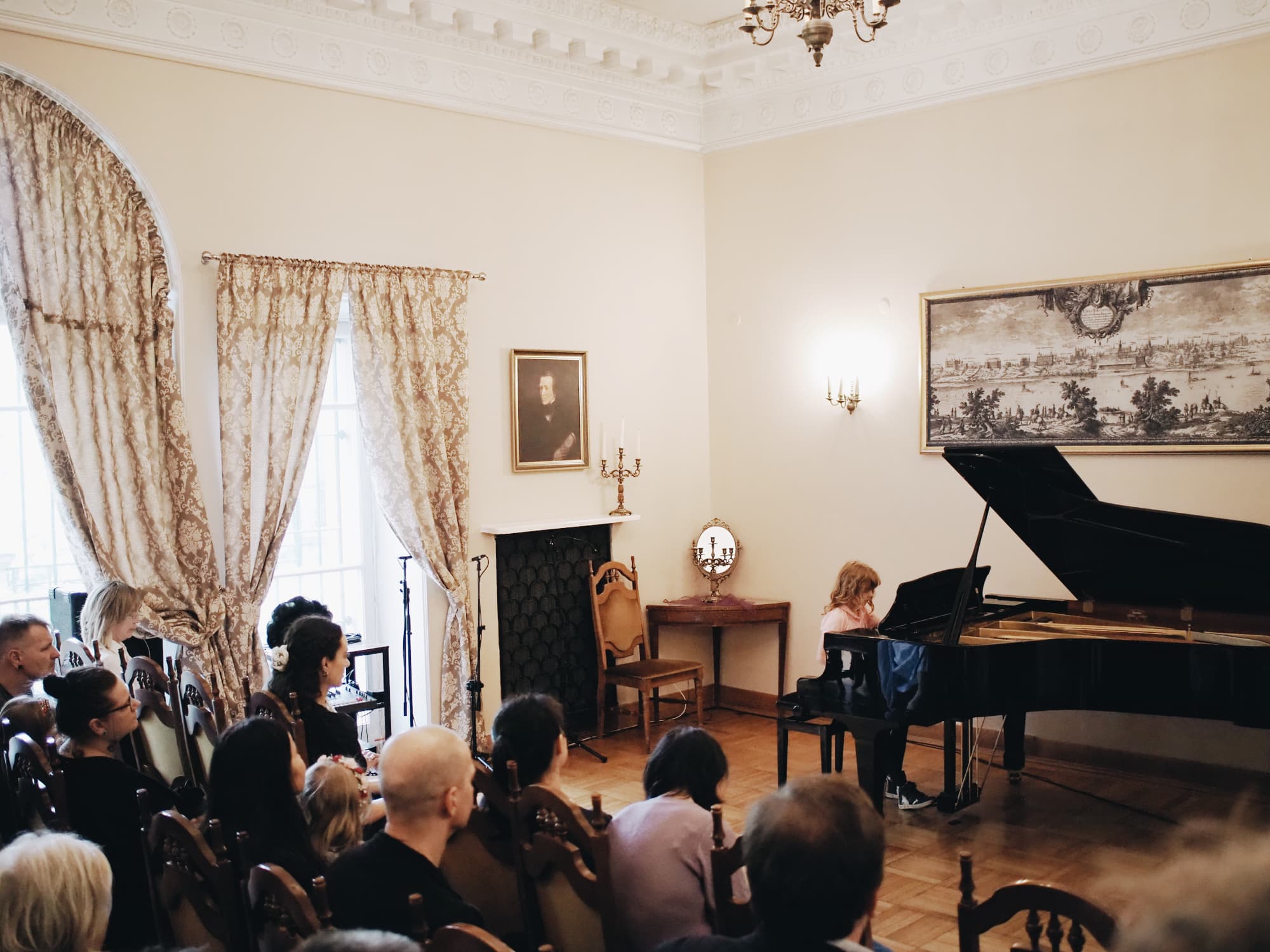 Piano performance before the audience A student performing at the grand piano at the Annual Concert of 2026