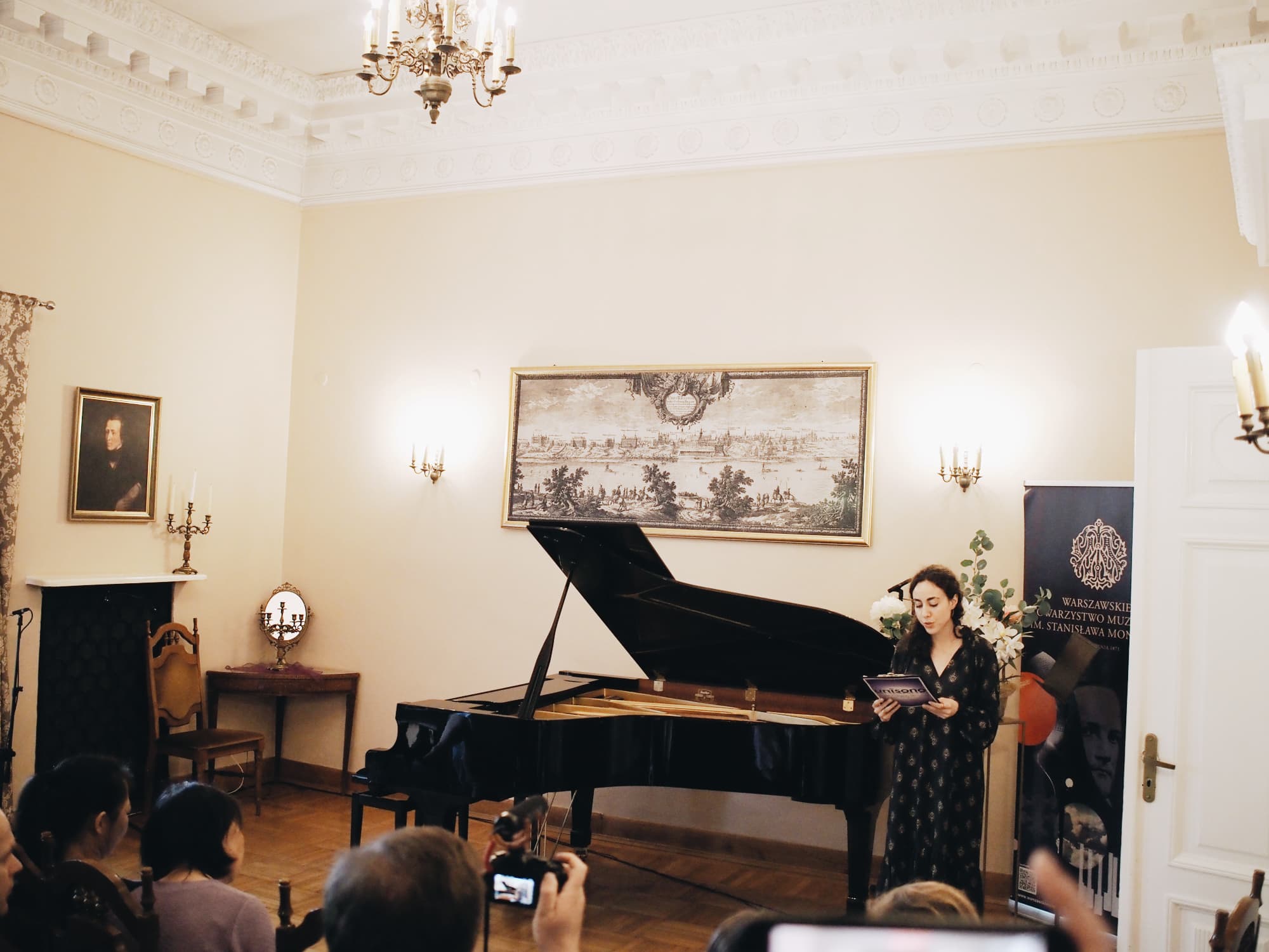 Violin performance at the Szuster Palace A violinist performing beside the grand piano at the Annual Concert of 2026