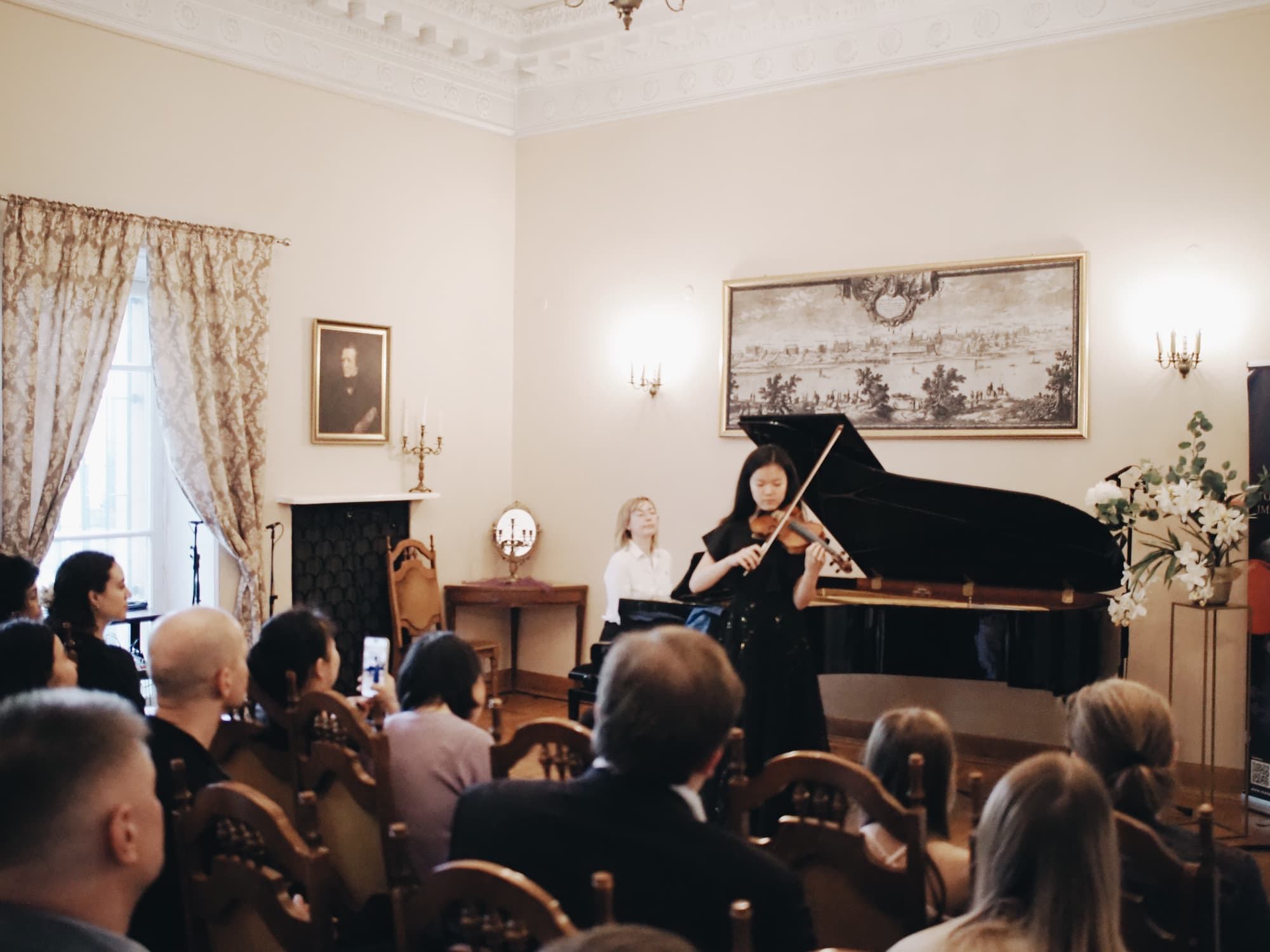 Violin solo before the audience A young violinist performing a solo at the Annual Concert of 2026