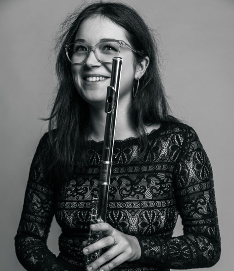 Kaja Morawiec holding a transverse flute, chamber musician and flute teacher in Warsaw